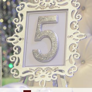 table numbers, frame, glitter